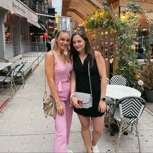 Pink jumpsuit with belt